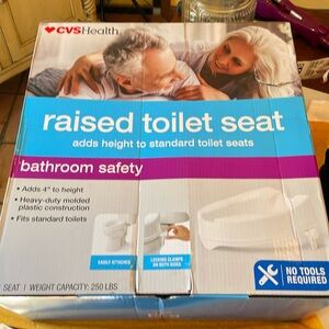 Raised toilet seat NIB